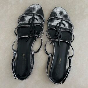 Saint Laurent YSL Cassandra logo flat sandals in metallic silver